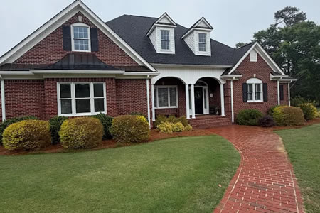 Protect Your Outdoor Spaces This Summer with Regular Pressure Washing